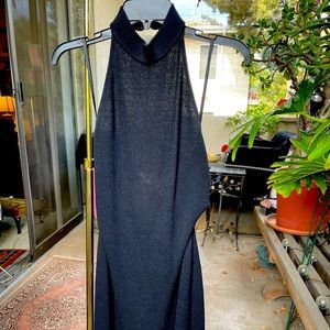 St. John Collection black knit backless fitted dress.